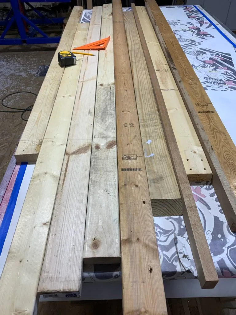 Blanks of different colored wood lying on a work bench
