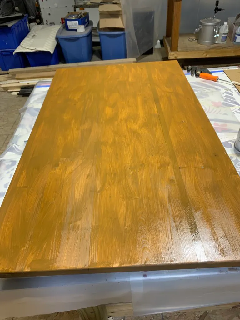 The plank of wood stained a single color