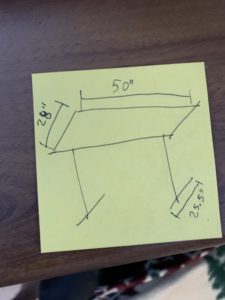 A sketch on a post-it note of the dimensions of my desk